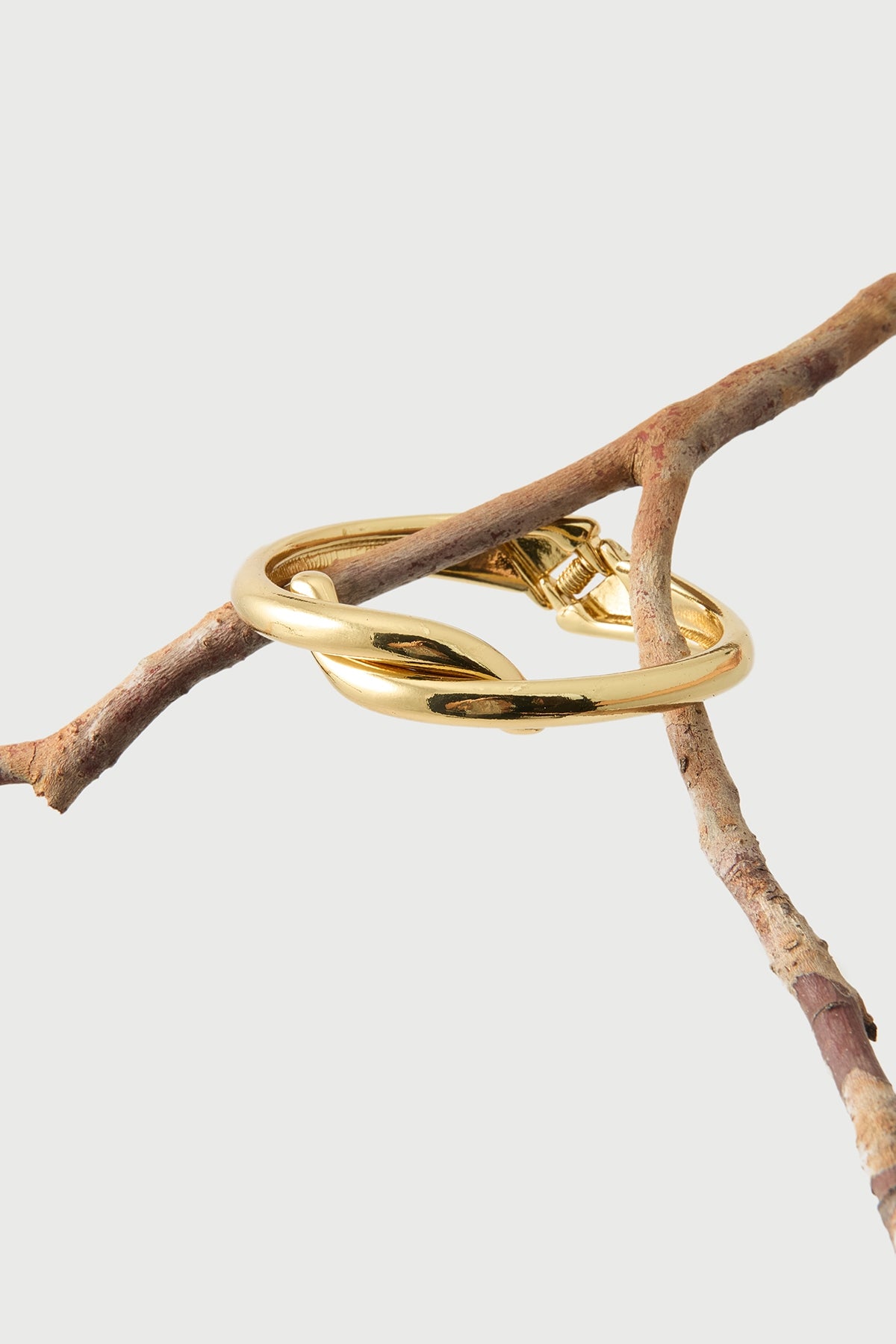 Perfect Stranger Twist Bangle Gold