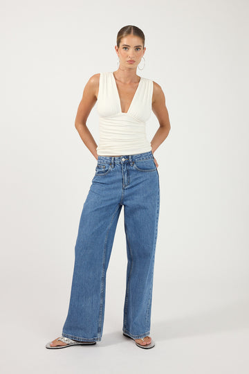 Perfect Stranger Petite Mid Rise Baggy Jean Mid Blue Denim